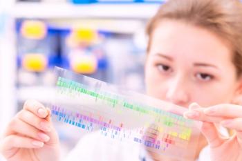 Young woman examines a spectroscopy picture in a quantum physics laboratory | Image Credit: © luchschenF - stock.adobe.com