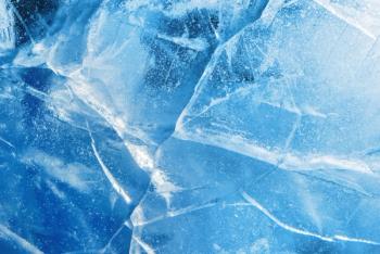 Abstract ice background. Blue background with cracks on the ice surface | Image Credit: © Leonid Akin - stock.adobe.com