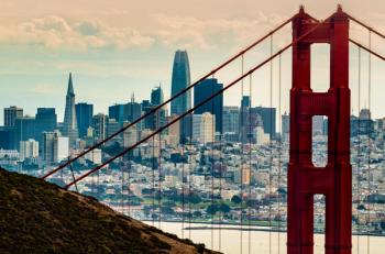 City of San Francisco Ca. Downtown business district seen through the north tower of the Golden Gate Bridge | Image Credit: © Larry D Crain - stock.adobe.com