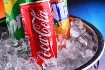 Cans of assorted Coca Cola Company soft drinks | Image Credit: © monticellllo - stock.adobe.com.