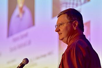 Mike Angel speaking.jpg