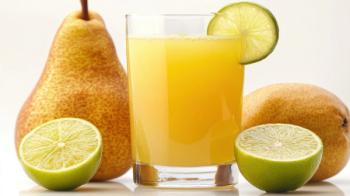 A refreshing glass of pear and lime juice with a slice of pear and lime on the rim, on a white background. Generated with AI. | Image Credit: Chandlerlikes -stock.adobe.com.