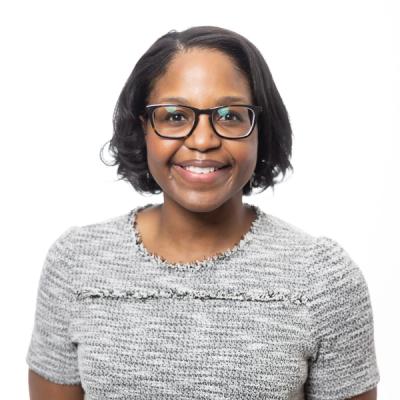 Anne M. Komé