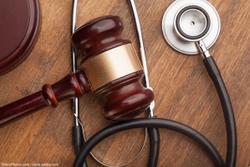 What makes a good expert witness in a malpractice case? 
