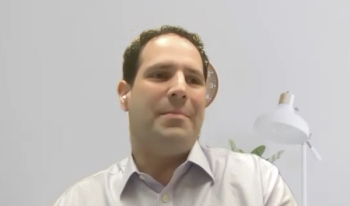 Colin Goudelocke, MD, answers a question during a Zoom video interview