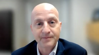 Craig G. Rogers, MD, answers a question during a Zoom video interview