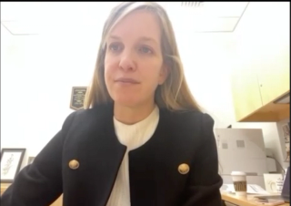 Sarah Vij, MD, answers a question during a Zoom video interview