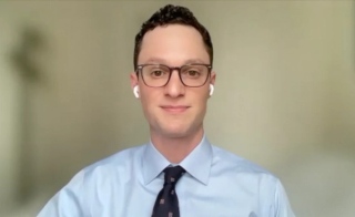 Leo Dreyfuss, MD, answers a question during a Zoom video interview