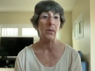 Lisa J. Finkelstein, DO, FACOS, answers a question during a Zoom video interview