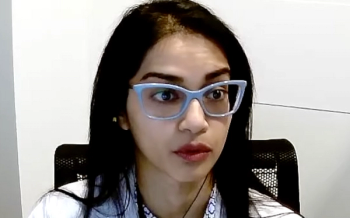 Raevti Bole, MD, answers a question during a Zoom video interview