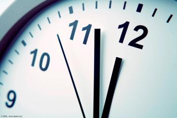 Close close-up of clock face. Hands pointing to twelve. Midday | Image Credit: © Stillfx - stock.adobe.com 