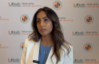 Raveen Syan, MD, FPMRS, answers a question during a video interview