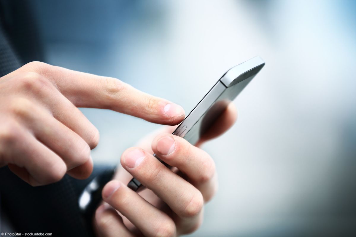 Close up of a man using mobile smart phone | Image Credit: © PhotoStar - stock.adobe.com 