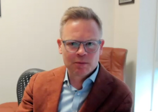 Marc Bjurlin, DO, MSc, FACOS, answers a question during a Zoom video interview