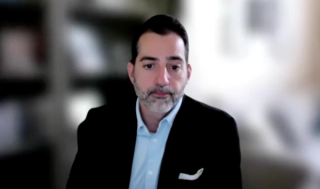 John Michael DiBianco, MD, answers a question during a Zoom video interview