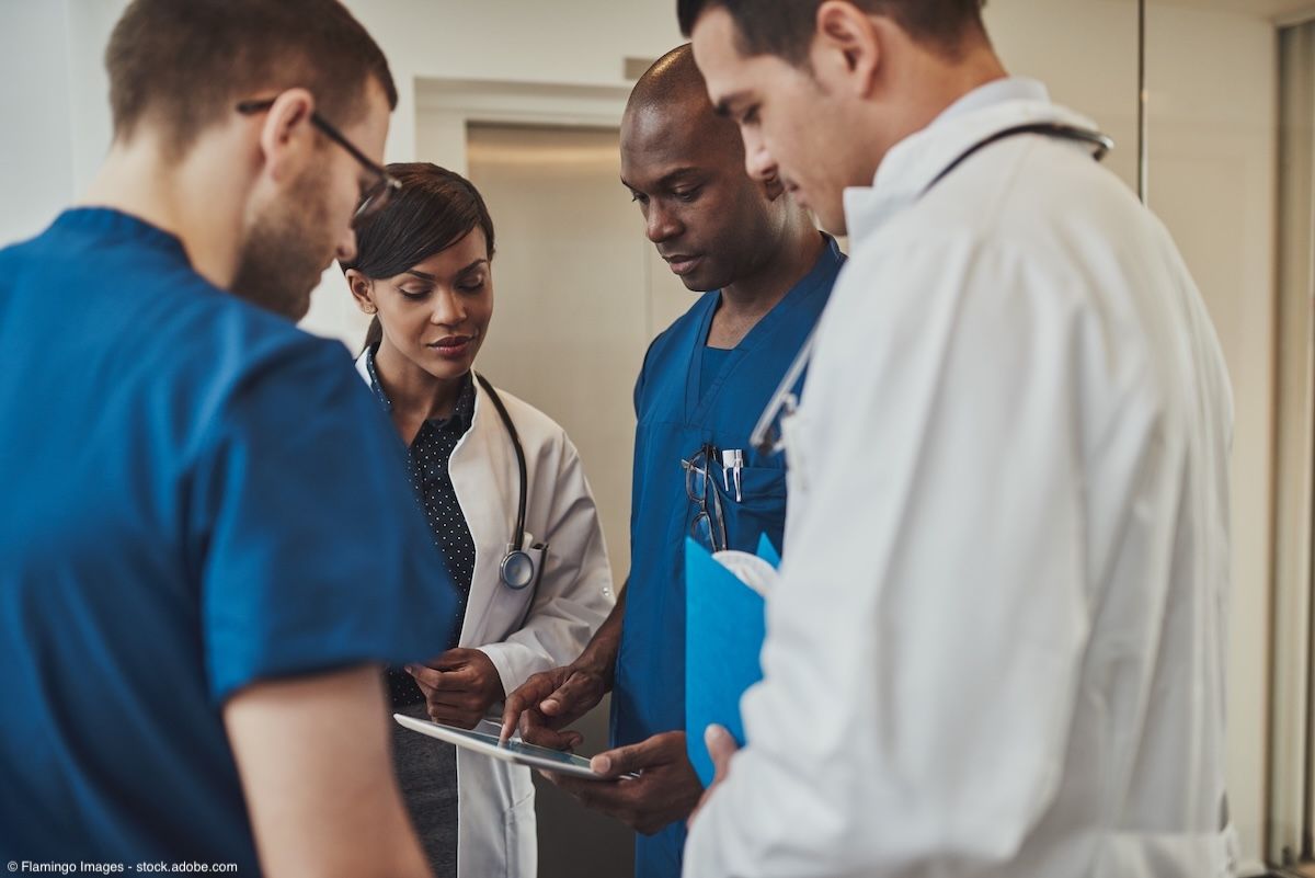 Diverse doctors having an emergency discussion | Image Credit: © Flamingo Images - stock.adobe.com
