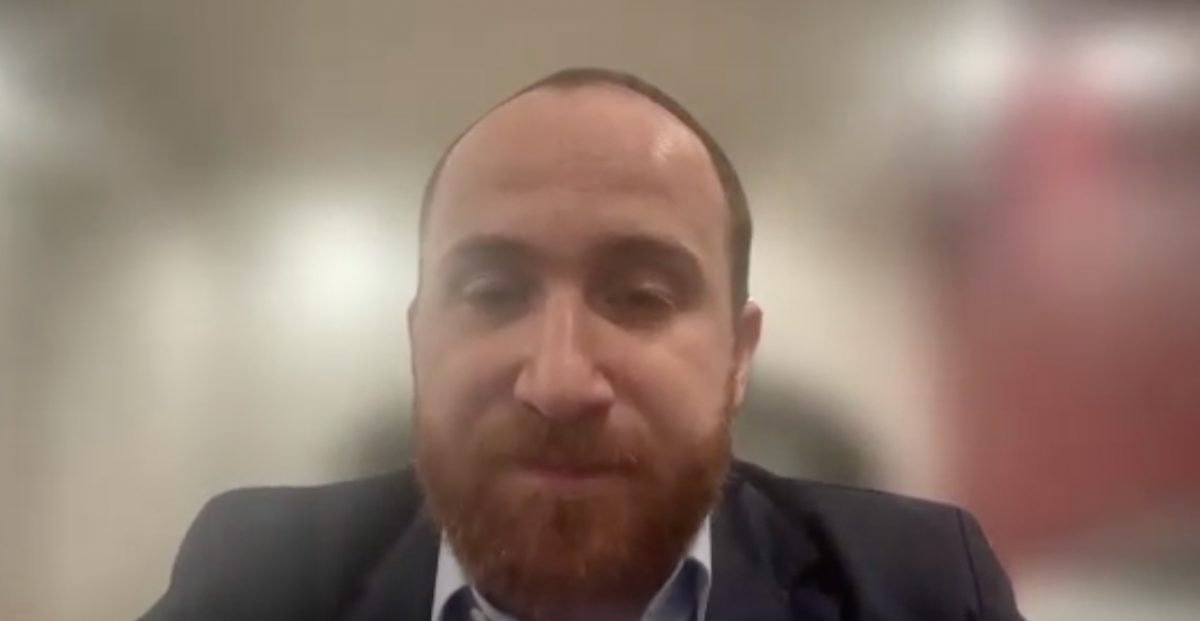 Mohamad Baker Berjaoui, MD, answers a question during a Zoom video interview