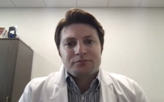 Jacob Taylor, MD, MPH, answers a question during a Zoom video interview