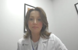 Suzanne B. Merrill, MD, FACS, answers a question during a Zoom video interview