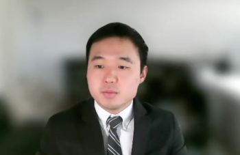 Perry Xu, MD, answers a question during Zoom video interview