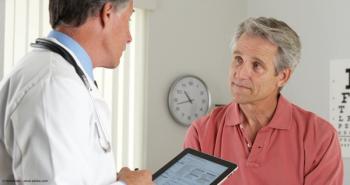 Senior doctor asking elderly patient questions | Image Credit: © rocketclips - stock.adobe.com 