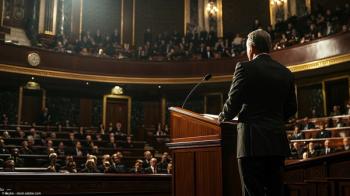Lawmaker stands at podium | Image Credit: © ckybe - stock.adobe.com