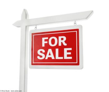 For sale sign on white background | Image Credit: © Africa Studio - stock.adobe.com