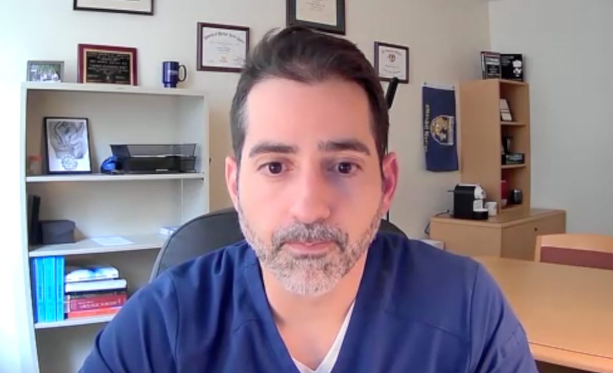John Michael DiBianco, MD, answers a question during a Zoom video interview