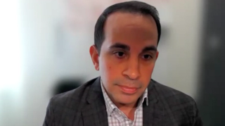 Keyan Salari, MD, PhD, answers a question during a Zoom video interview