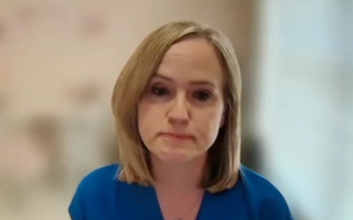 Katherine Chan, MD, MPH, gives an answer during a Zoom video interview