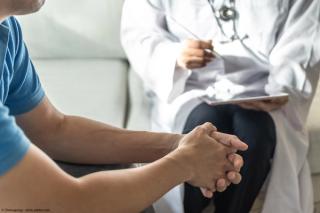 Man talking with a doctor | Image Credit: © Chinnapong - stock.adobe.com