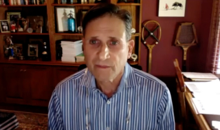 Andrew L. Siegel, MD, answers a question during a Zoom video interview