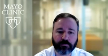 Derek J. Lomas, MD, PharmD, answers a question during a Zoom interview