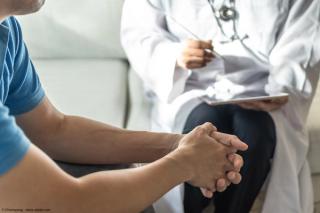 Man talking with a doctor | Image Credit: © Chinnapong - stock.adobe.com