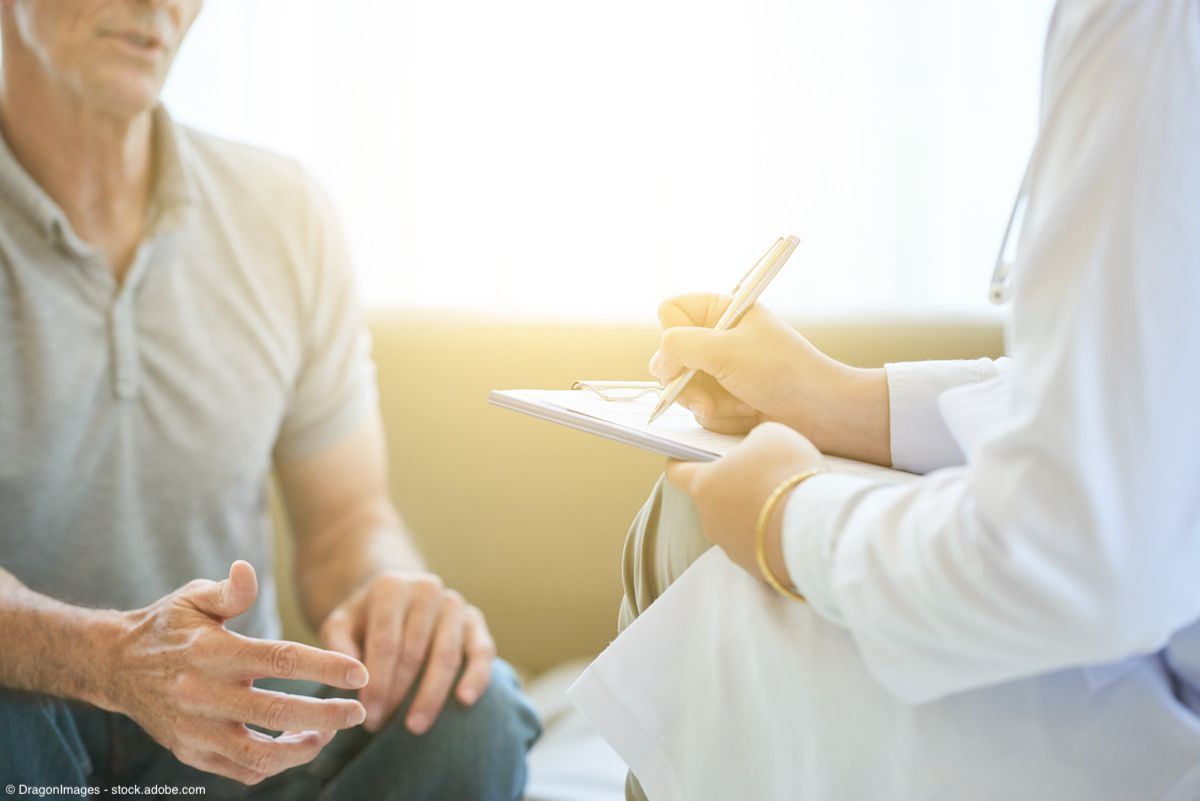 Man talking with doctor, who is taking notes on a clipboard | Image Credit: © DragonImages - stock.adobe.com