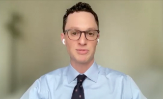 Leo Dreyfuss, MD, answers a question during a Zoom video interview