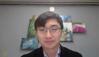 Kevin Shee, MD, PhD, answers a question during a Zoom video interview