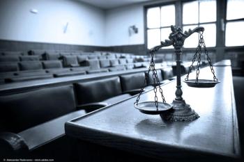 Decorative scales of justice in the courtroom | Image Credit: © Aleksandar Radovanov - stock.adobe.com