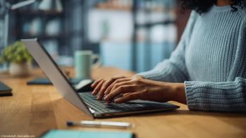 Woman typing on laptop | Image Credit: © Gorodenkoff - stock.adobe.com