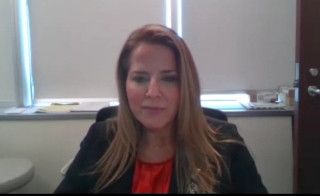 Amy E. Krambeck, MD, answers a question during a Zoom video interview