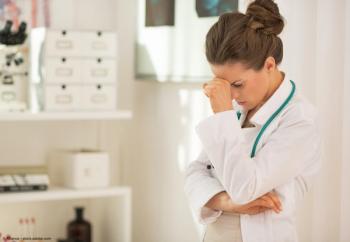Portrait of stressed doctor woman in office | Image Credit: © Alliance - stock.adobe.com