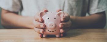 Person holding piggy bank | Image Credit: © Monster Ztudio - stock.adobe.com