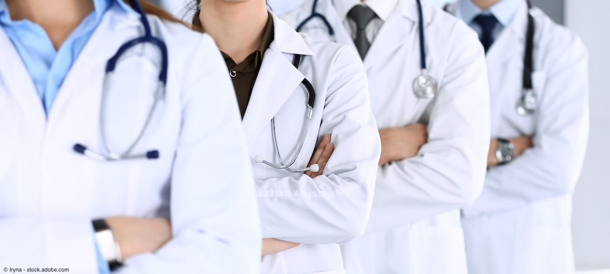 Group of doctors with arms crossed | Image Credit: © Iryna - stock.adobe.com