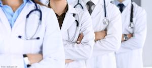 Group of doctors with arms crossed | Image Credit: © Iryna - stock.adobe.com