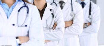 Group of doctors with arms crossed | Image Credit: © Iryna - stock.adobe.com