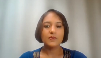 Smita De, MD, PhD, answers a question during a Zoom video interview