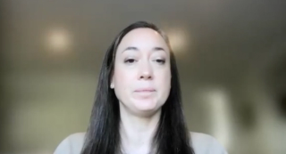 Lindsay A. Hampson, MD, MAS, answers a question during a Zoom video interview