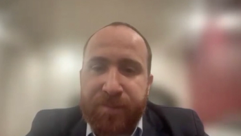 Mohamad Baker Berjaoui, MD, answers a question during a Zoom video interview