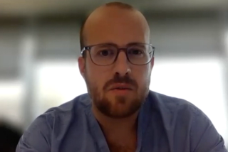 Glenn T. Werneburg, MD, PhD, answers a question during a Zoom video interview