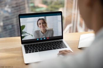 Rear over shoulder view of man talk speak with smiling female colleagues on video online call on laptop. Diverse businesspeople have webcam digital virtual zoom meeting. Communication concept. | Image Credit: © fizkes - stock.adobe.com 
